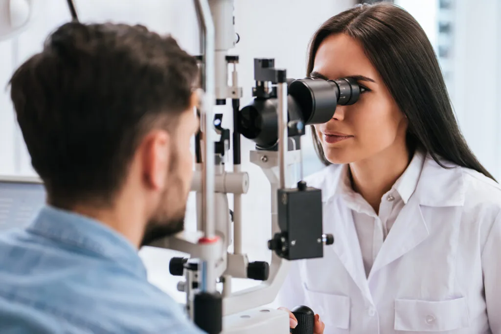 Doctor and patient in ophthalmology clinic